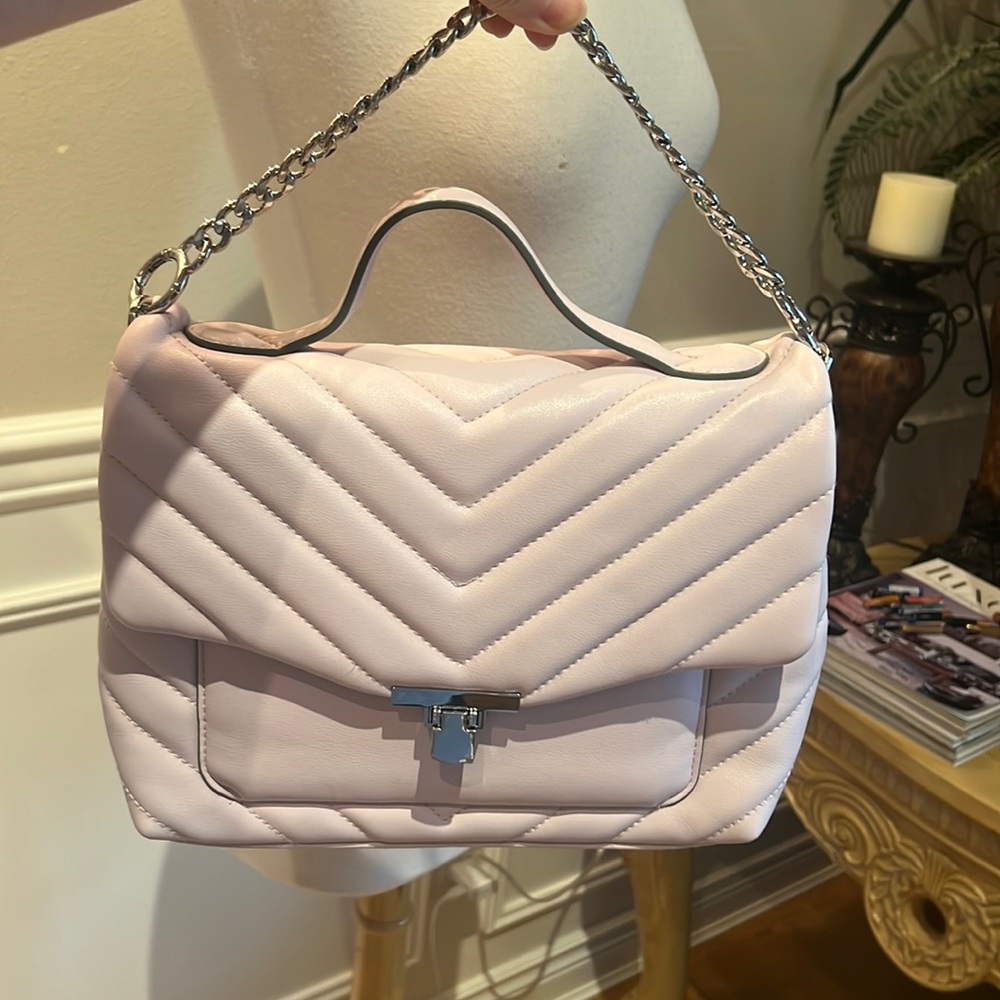 A new day bag, great condition, light lavender color